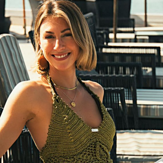 Handcrafted Jade Botanica crochet halter top featuring intricate crochet detailing, a flattering halter neckline, and elegant jade-green tones inspired by tropical botanical landscapes.